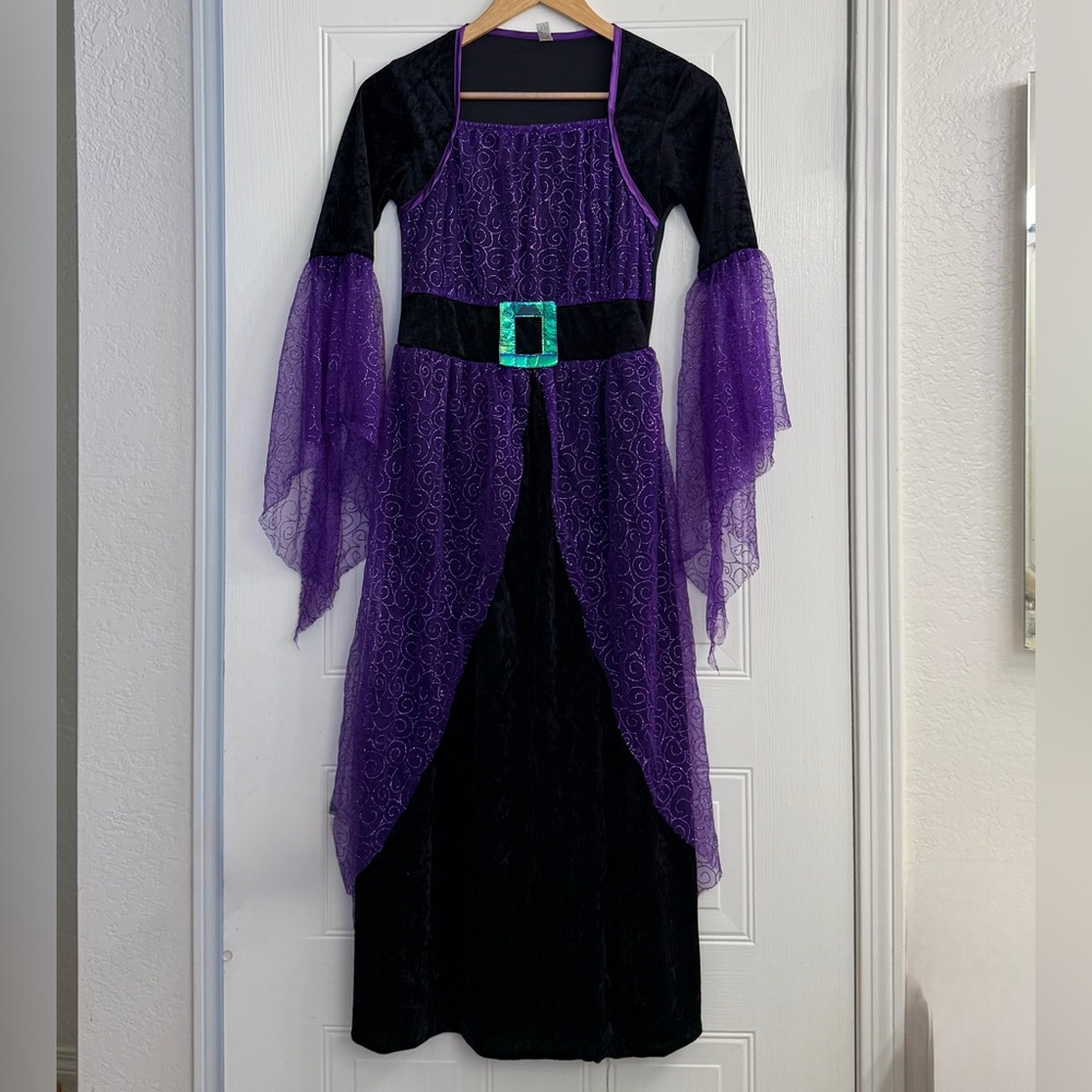 Purple and Black Kids Witch Costume Size 12-14.  Worn once. Good Condition.